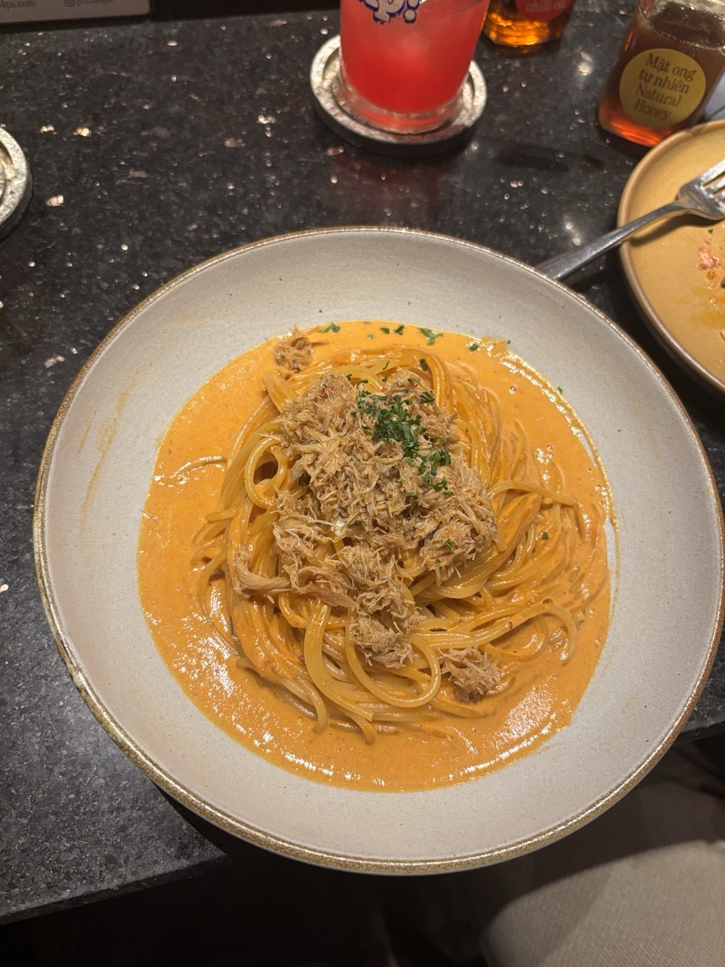 Crab spaghetti in a creamy tomato sauce, from above